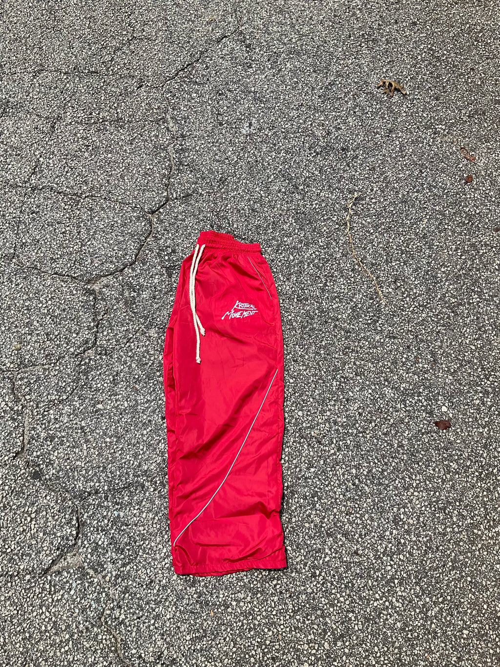 Red windbreaker sweats