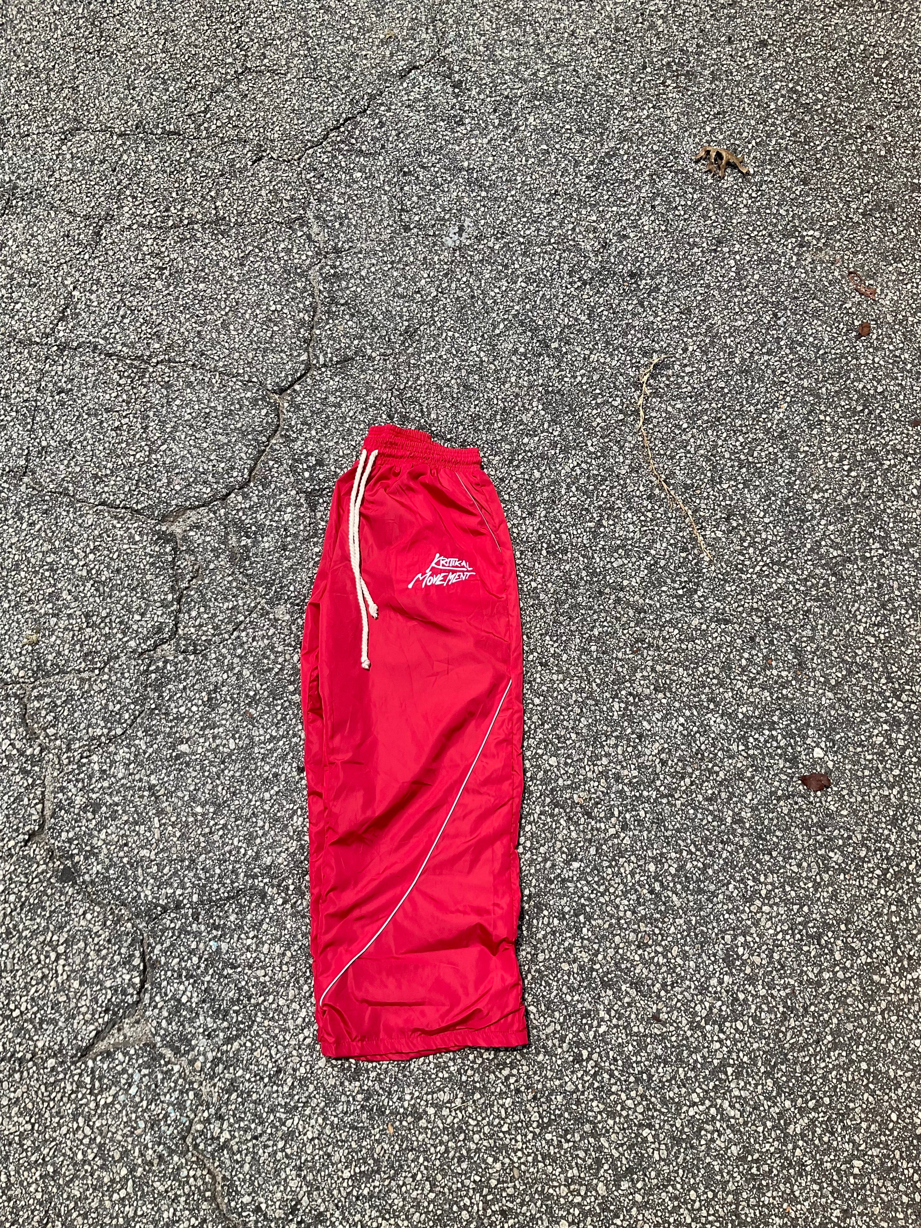 Red windbreaker sweats
