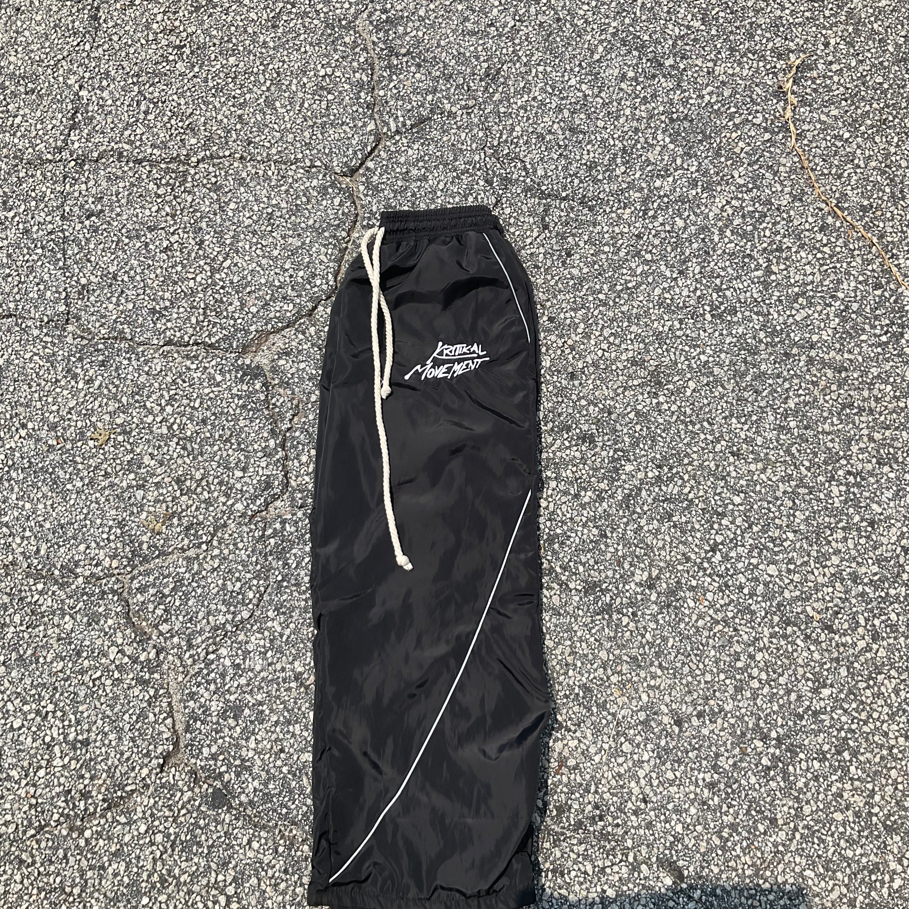 Black windbreaker sweats