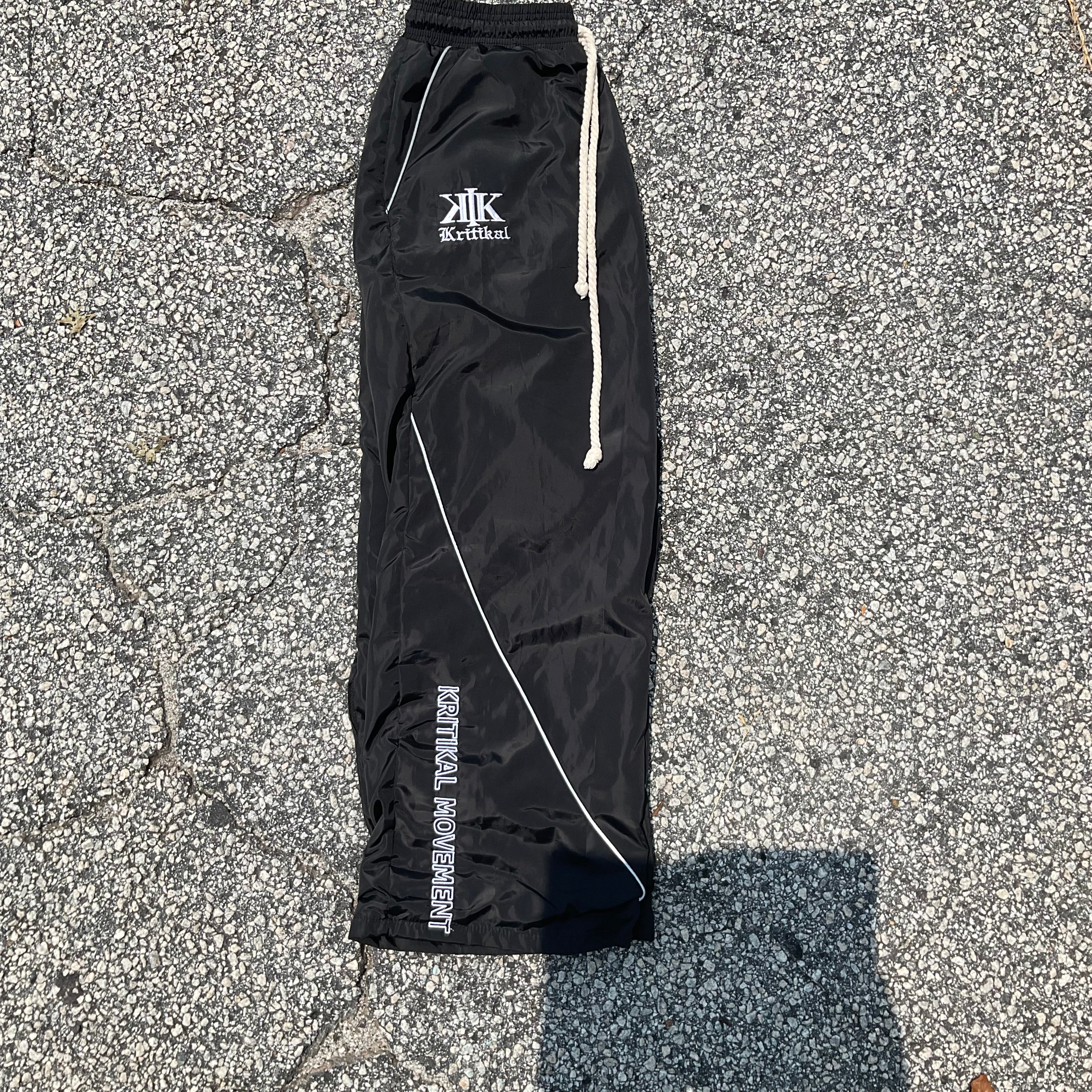 Black windbreaker sweats