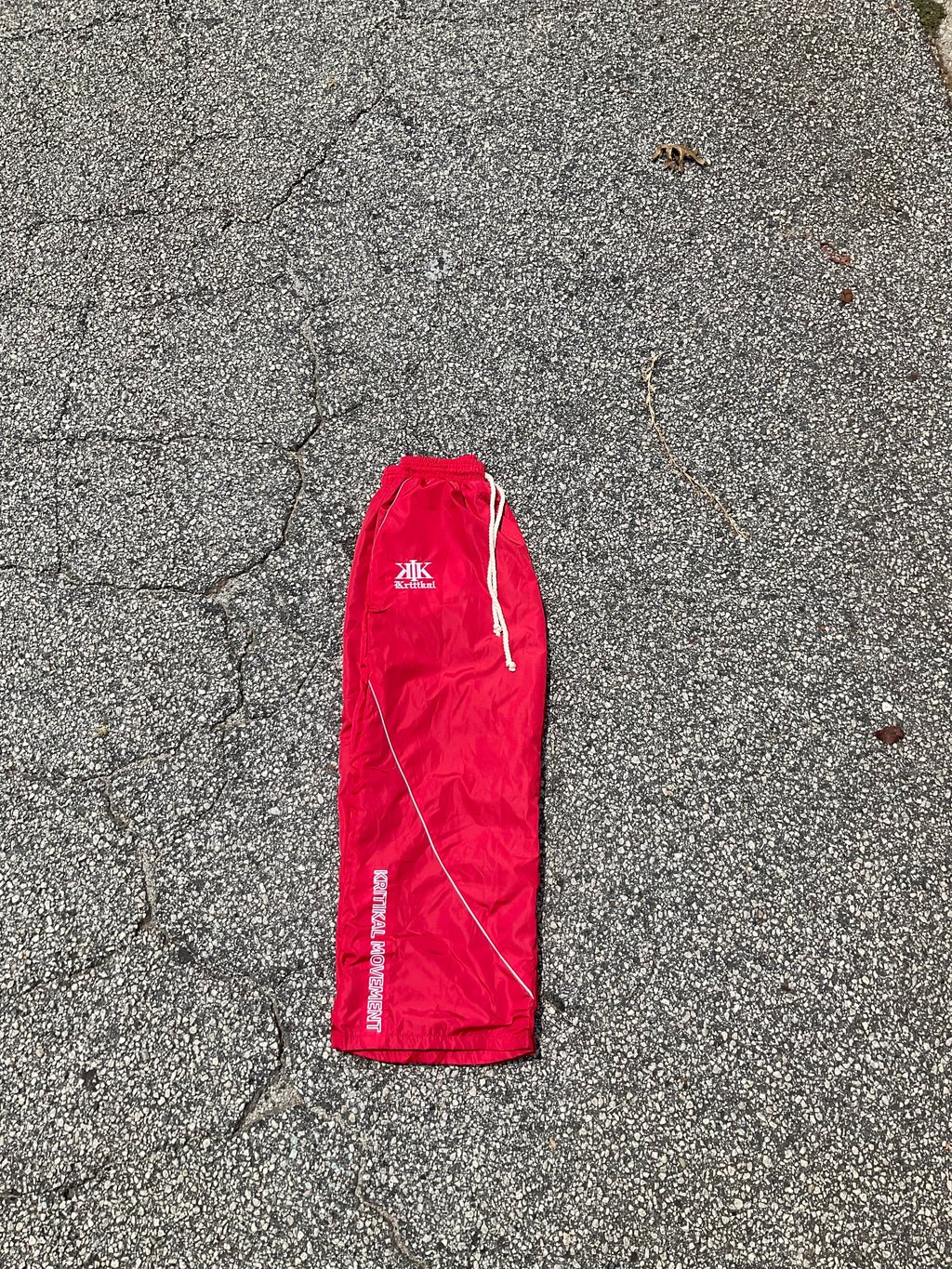 Red windbreaker sweats
