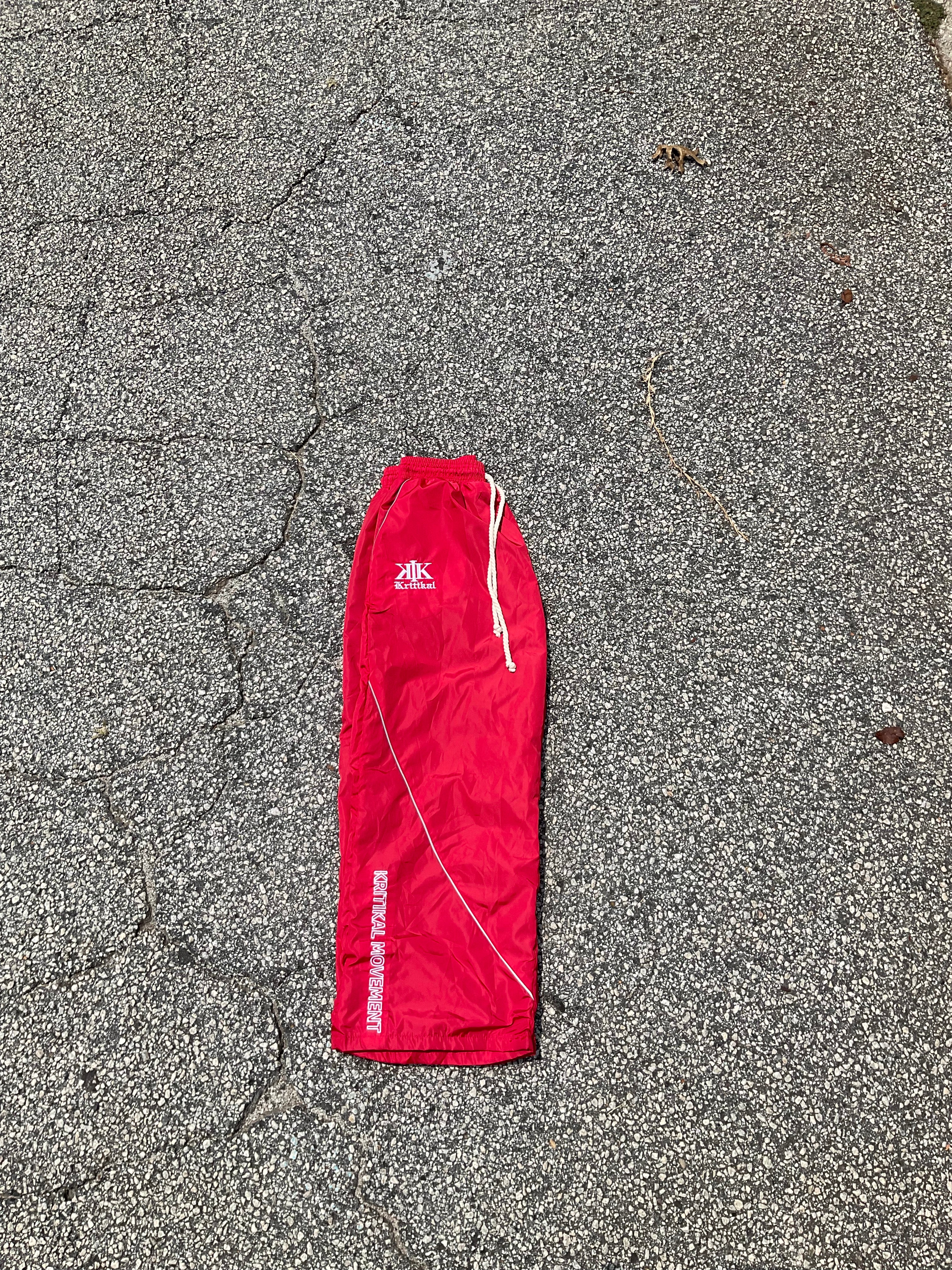 Red windbreaker sweats